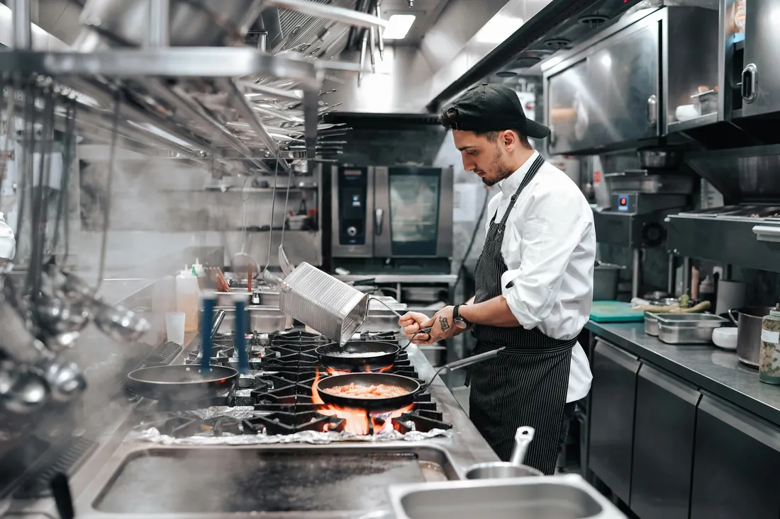 Chef working in a commercial restaurant kitchen